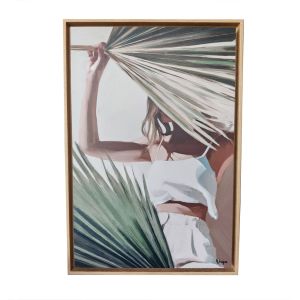 TABLEAU FEMME AU SOLEIL CACHE DERRIERE UNE FEUILLE DE PALMIER ORYA 46 X 66 CM