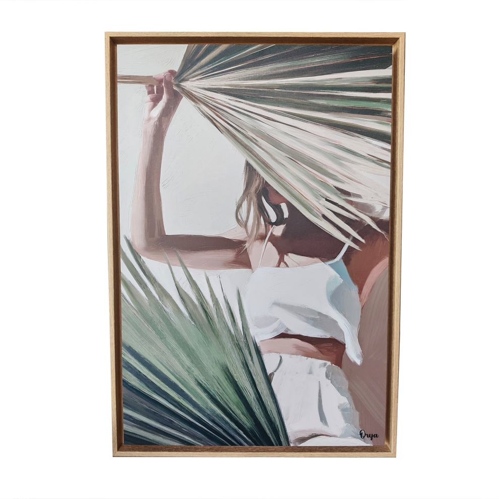 TABLEAU FEMME AU SOLEIL CACHE DERRIERE UNE FEUILLE DE PALMIER ORYA 46 X 66 CM - Photo N°1